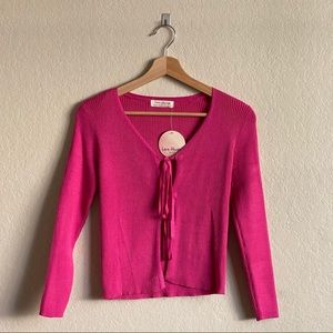 Bright pink mini cardigan with knots